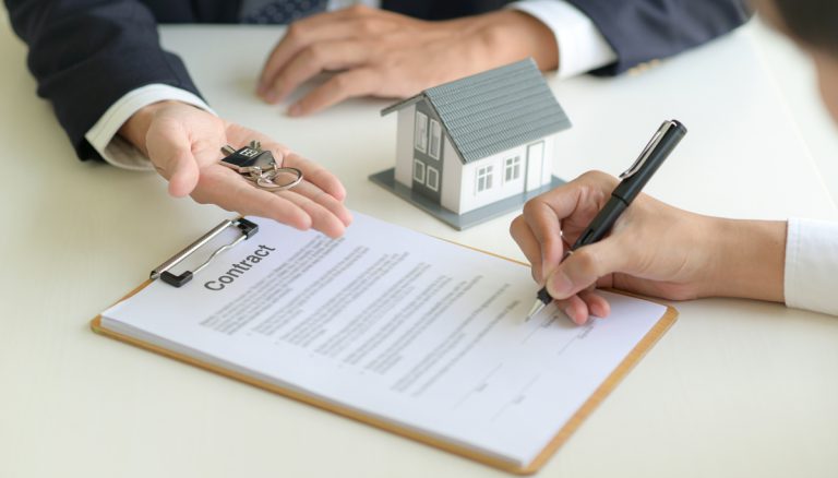 Client signing a real estate contract
